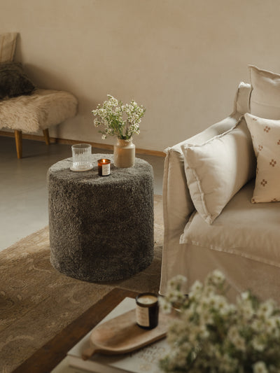 sheepskin pouffe in clean scandi interiors, very hygge