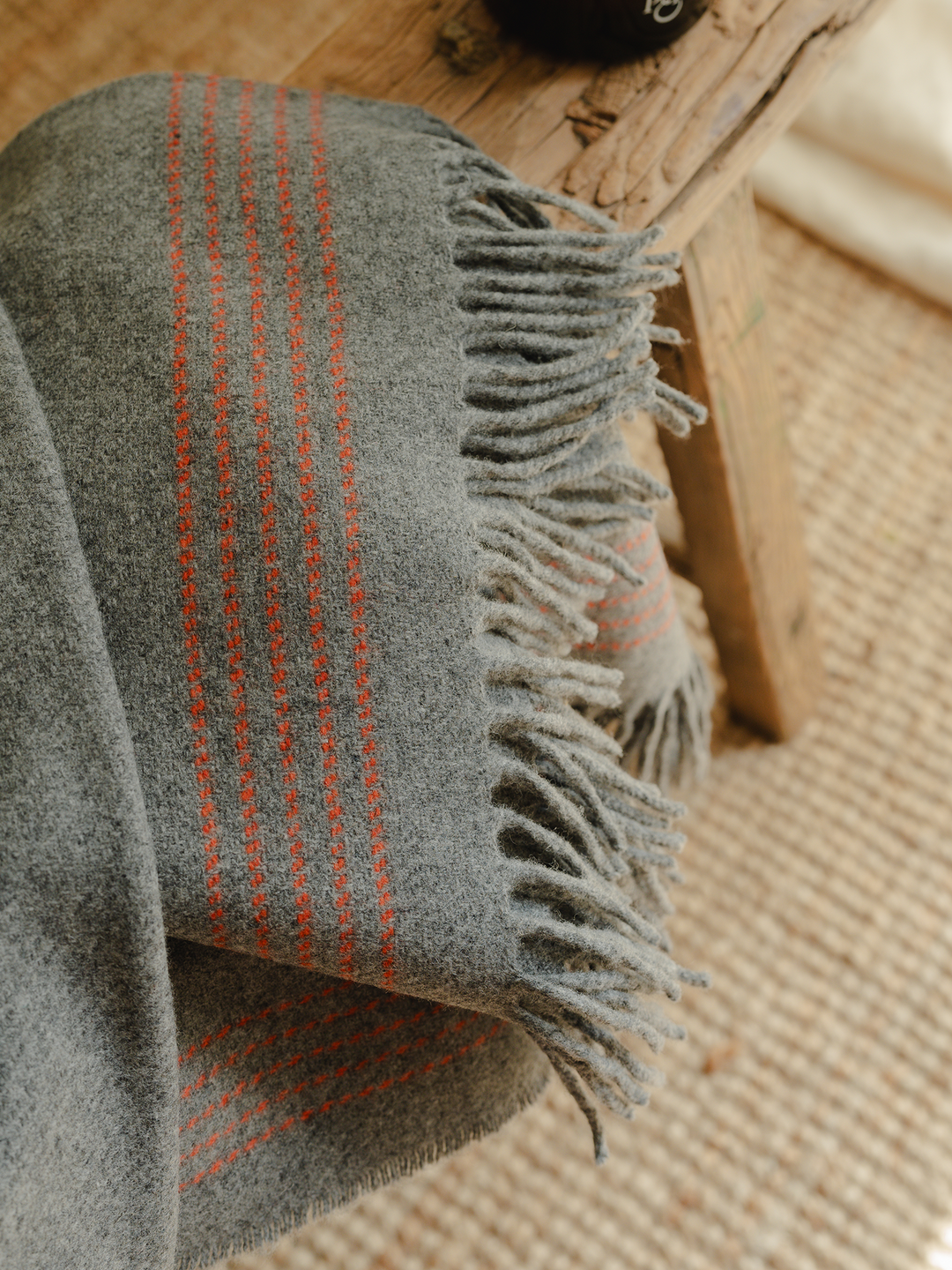 The Morar Cashmere Throw Steel and Orange – Hyde Hare
